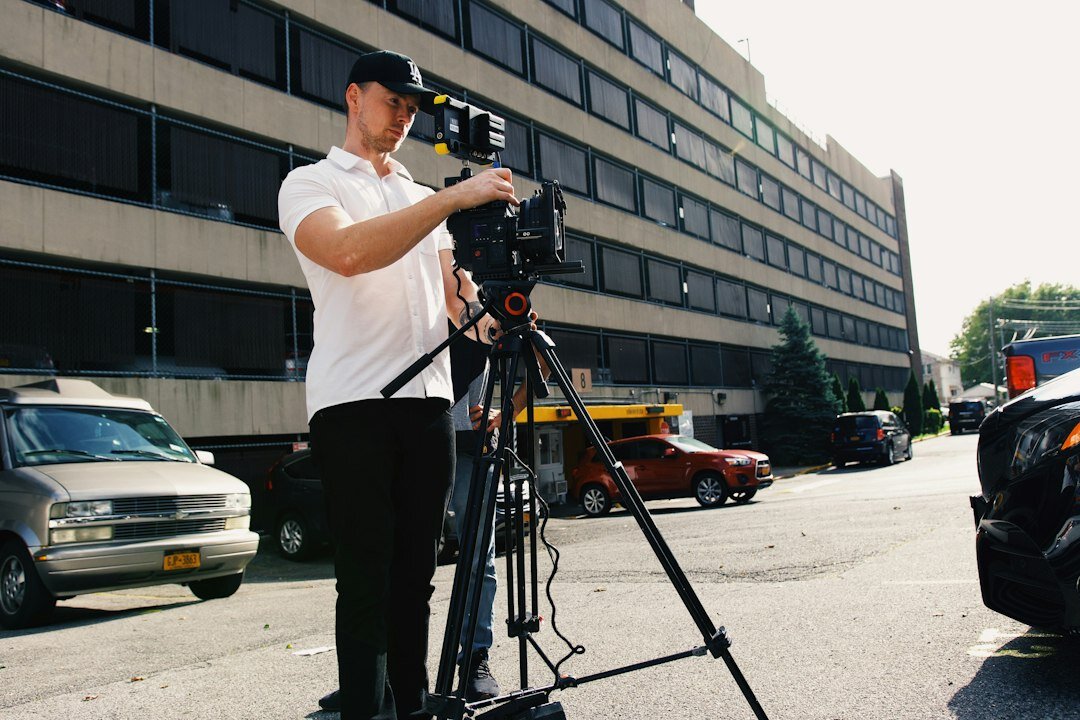 filmmaker with camera on set